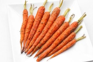 Easy Garlic and Herb Roasted Carrots is the perfect side dish to your holiday